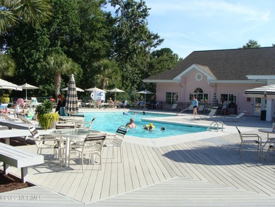 Large, wooded lot on Oyster Bay #11 Hole in Sea Trail Plantation on Sea Trail Golf Resort in North Carolina - for sale on GolfHomes.com, golf home, golf lot