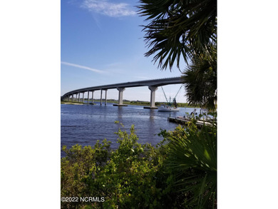 Large, wooded lot on Oyster Bay #11 Hole in Sea Trail Plantation on Sea Trail Golf Resort in North Carolina - for sale on GolfHomes.com, golf home, golf lot