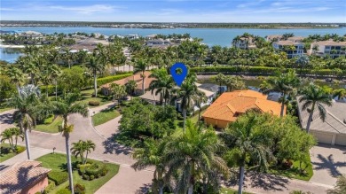 Nestled along the water, this breathtaking estate home on Miromar Lakes Golf Club in Florida - for sale on GolfHomes.com, golf home, golf lot