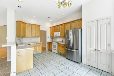 This extended Danbury model overlooks the 7th hole of the golf on Four Seasons Spa and Country Club in New Jersey - for sale on GolfHomes.com, golf home, golf lot