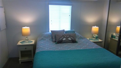 This adorable park model is conveniently located at the front of on Lily Lake Golf and RV Resort in Florida - for sale on GolfHomes.com, golf home, golf lot