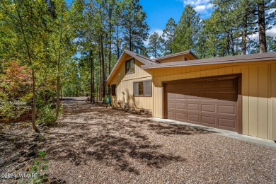 Escape to this adorable, remodeled 3 bedroom 2 bath cabin on Pinetop Lakes Country Club in Arizona - for sale on GolfHomes.com, golf home, golf lot