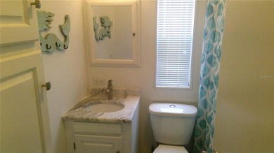 This adorable park model is conveniently located at the front of on Lily Lake Golf and RV Resort in Florida - for sale on GolfHomes.com, golf home, golf lot