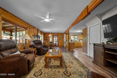 Escape to this adorable, remodeled 3 bedroom 2 bath cabin on Pinetop Lakes Country Club in Arizona - for sale on GolfHomes.com, golf home, golf lot