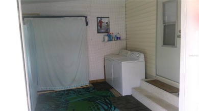 This adorable park model is conveniently located at the front of on Lily Lake Golf and RV Resort in Florida - for sale on GolfHomes.com, golf home, golf lot