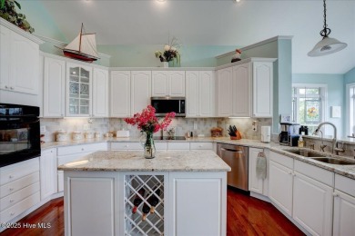 This beautiful waterfront home has been meticulously maintained on Harbour Point Golf Club in North Carolina - for sale on GolfHomes.com, golf home, golf lot
