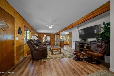 Escape to this adorable, remodeled 3 bedroom 2 bath cabin on Pinetop Lakes Country Club in Arizona - for sale on GolfHomes.com, golf home, golf lot