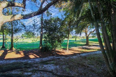 Nestled in a sought-after golf club community, this 3-bedroom on Jacaranda Golf Club in Florida - for sale on GolfHomes.com, golf home, golf lot