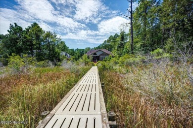 This beautiful waterfront home has been meticulously maintained on Harbour Point Golf Club in North Carolina - for sale on GolfHomes.com, golf home, golf lot