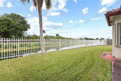 Welcome to this beautifully located 4 bed, 2 bath residence in on Jim McLean Signature Course in Florida - for sale on GolfHomes.com, golf home, golf lot