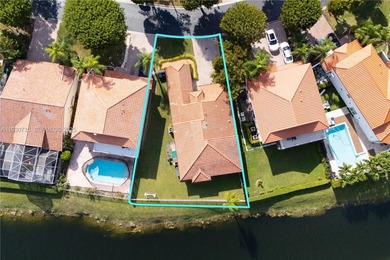 Welcome to this beautifully located 4 bed, 2 bath residence in on Jim McLean Signature Course in Florida - for sale on GolfHomes.com, golf home, golf lot