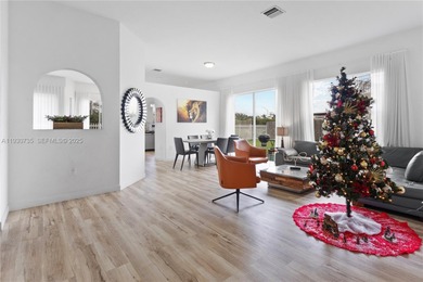 Welcome to this beautifully located 4 bed, 2 bath residence in on Jim McLean Signature Course in Florida - for sale on GolfHomes.com, golf home, golf lot