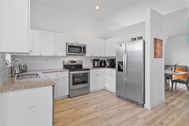 Welcome to this beautifully located 4 bed, 2 bath residence in on Jim McLean Signature Course in Florida - for sale on GolfHomes.com, golf home, golf lot