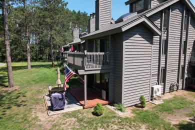 Discover the epitome of convenience and comfort in this on Michaywe Pines Course in Michigan - for sale on GolfHomes.com, golf home, golf lot