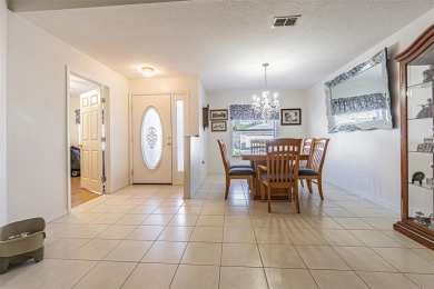 Beautifully updated 1,421 square foot home that features an on Tampa Bay Golf and Country Club in Florida - for sale on GolfHomes.com, golf home, golf lot