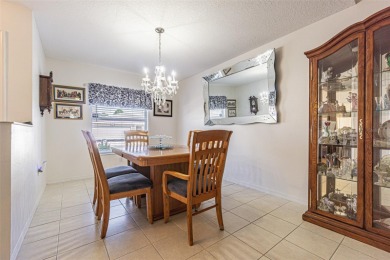 Beautifully updated 1,421 square foot home that features an on Tampa Bay Golf and Country Club in Florida - for sale on GolfHomes.com, golf home, golf lot