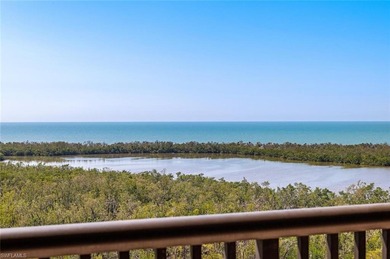 Imagine living amidst the colors of the sea in this on Club at Pelican Bay Golf Course in Florida - for sale on GolfHomes.com, golf home, golf lot