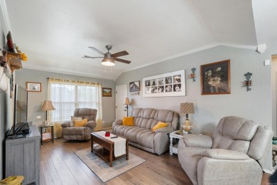 This charming, well-maintained 3 bedroom, 2 bath home is nestled on Silver Springs Country Club in Arkansas - for sale on GolfHomes.com, golf home, golf lot