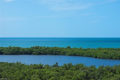 Imagine living amidst the colors of the sea in this on Club at Pelican Bay Golf Course in Florida - for sale on GolfHomes.com, golf home, golf lot