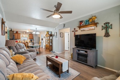 This charming, well-maintained 3 bedroom, 2 bath home is nestled on Silver Springs Country Club in Arkansas - for sale on GolfHomes.com, golf home, golf lot