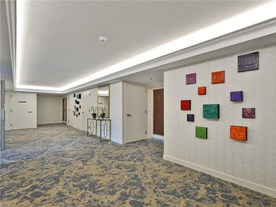 Imagine living amidst the colors of the sea in this on Club at Pelican Bay Golf Course in Florida - for sale on GolfHomes.com, golf home, golf lot