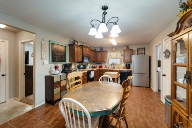 This charming, well-maintained 3 bedroom, 2 bath home is nestled on Silver Springs Country Club in Arkansas - for sale on GolfHomes.com, golf home, golf lot