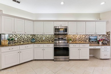 An aviation lifestyle awaits in this exceptional home located on Spruce Creek Golf Club in Florida - for sale on GolfHomes.com, golf home, golf lot