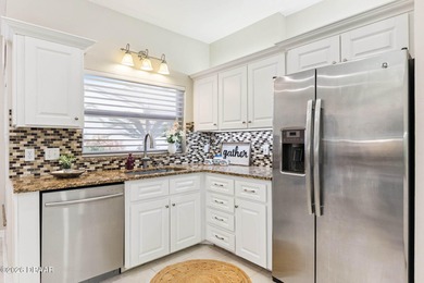 An aviation lifestyle awaits in this exceptional home located on Spruce Creek Golf Club in Florida - for sale on GolfHomes.com, golf home, golf lot