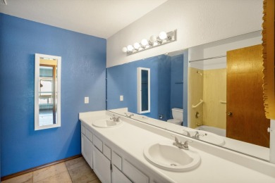 This stylish penthouse townhouse features 2 bedrooms and 1.5 on Arroyo Del Oso Golf Course in New Mexico - for sale on GolfHomes.com, golf home, golf lot