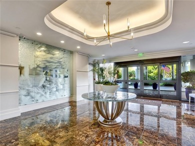 Imagine living amidst the colors of the sea in this on Club at Pelican Bay Golf Course in Florida - for sale on GolfHomes.com, golf home, golf lot