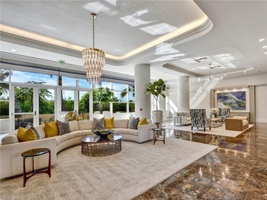 Imagine living amidst the colors of the sea in this on Club at Pelican Bay Golf Course in Florida - for sale on GolfHomes.com, golf home, golf lot