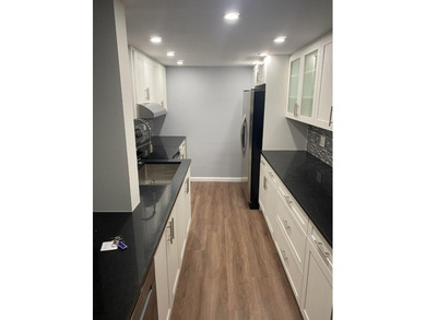 This spacious 2-bedroom, 2-bathroom unit features an open living on Inverrary Country Club in Florida - for sale on GolfHomes.com, golf home, golf lot