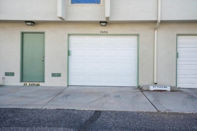 This stylish penthouse townhouse features 2 bedrooms and 1.5 on Arroyo Del Oso Golf Course in New Mexico - for sale on GolfHomes.com, golf home, golf lot