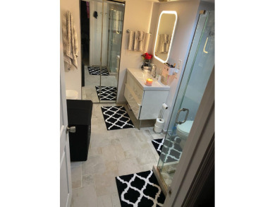 This spacious 2-bedroom, 2-bathroom unit features an open living on  in Florida - for sale on GolfHomes.com, golf home, golf lot