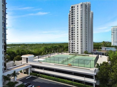 Imagine living amidst the colors of the sea in this on Club at Pelican Bay Golf Course in Florida - for sale on GolfHomes.com, golf home, golf lot