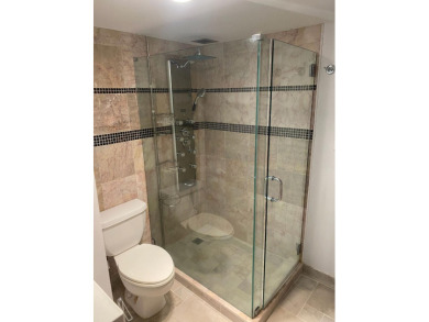 This spacious 2-bedroom, 2-bathroom unit features an open living on  in Florida - for sale on GolfHomes.com, golf home, golf lot