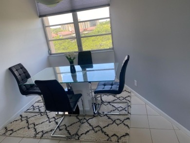 This spacious 2-bedroom, 2-bathroom unit features an open living on  in Florida - for sale on GolfHomes.com, golf home, golf lot