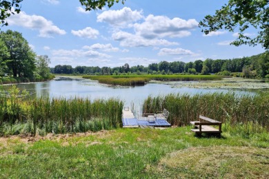 This half acre lot is a stones throw away from one of Canadian on St. Ives Golf Club in Michigan - for sale on GolfHomes.com, golf home, golf lot
