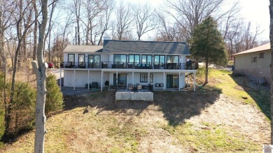 Panoramic waterfront views from this totally remodeled lake home on Boots Randolph Golf Course in Kentucky - for sale on GolfHomes.com, golf home, golf lot