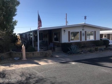 Very nice mostly furnished north facing home with newer windows on Tucson Estates Golf Course in Arizona - for sale on GolfHomes.com, golf home, golf lot