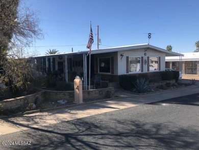 Very nice mostly furnished north facing home with newer windows on Tucson Estates Golf Course in Arizona - for sale on GolfHomes.com, golf home, golf lot