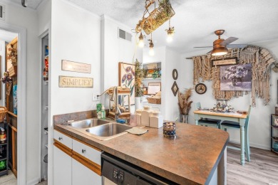 Welcome to Williamsburg Landing, a charming 2-bedroom, 1.5-bath on Cane Patch Driving Range in South Carolina - for sale on GolfHomes.com, golf home, golf lot