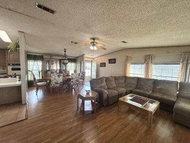 ***This home is located within a 55+ resort style leased land on Big Cypress Golf and Country Club in Florida - for sale on GolfHomes.com, golf home, golf lot
