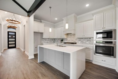 This popular single story Altura Aspen floorplan is now on Heath Golf and Yacht Club in Texas - for sale on GolfHomes.com, golf home, golf lot