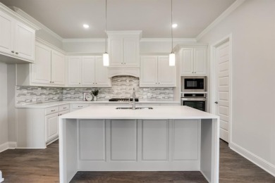 This popular single story Altura Aspen floorplan is now on Heath Golf and Yacht Club in Texas - for sale on GolfHomes.com, golf home, golf lot