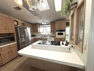 ***This home is located within a 55+ resort style leased land on Big Cypress Golf and Country Club in Florida - for sale on GolfHomes.com, golf home, golf lot