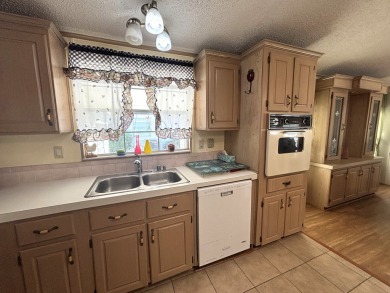 ***This home is located within a 55+ resort style leased land on Big Cypress Golf and Country Club in Florida - for sale on GolfHomes.com, golf home, golf lot