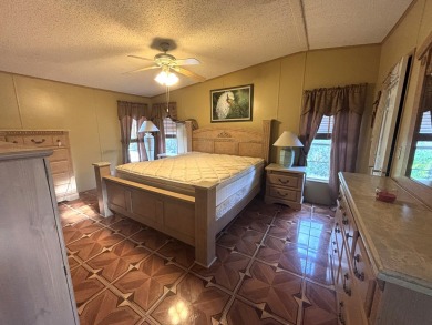 ***This home is located within a 55+ resort style leased land on Big Cypress Golf and Country Club in Florida - for sale on GolfHomes.com, golf home, golf lot