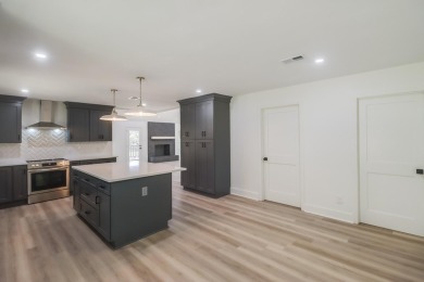 This home has been totally renovated and is located on the #7 on Diamondhead Country Club in Mississippi - for sale on GolfHomes.com, golf home, golf lot