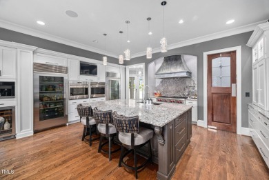 Welcome to an unparalleled sanctuary of luxury!  This on Hasentree Club in North Carolina - for sale on GolfHomes.com, golf home, golf lot